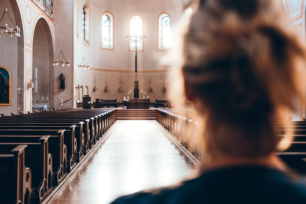 Girl entering the Church to pray