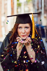 Girl celebrating on her college graduation day