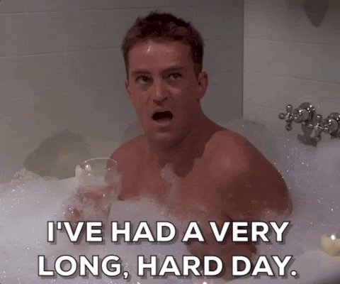 Friends Chandler sitting in a bathtub